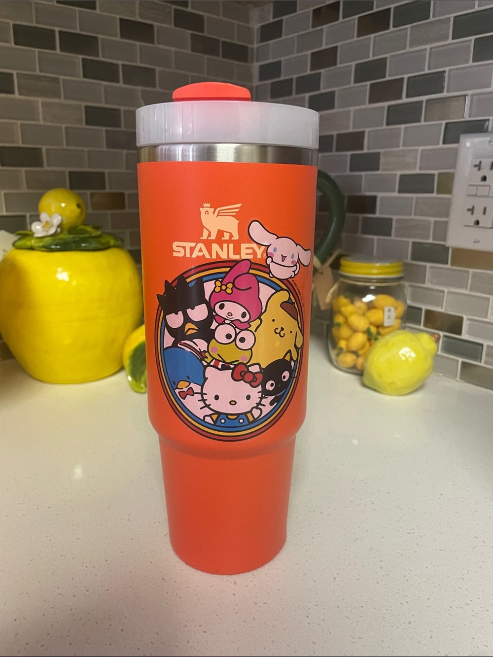 Stanley Orange Travel Tumbler with Sanrio Characters